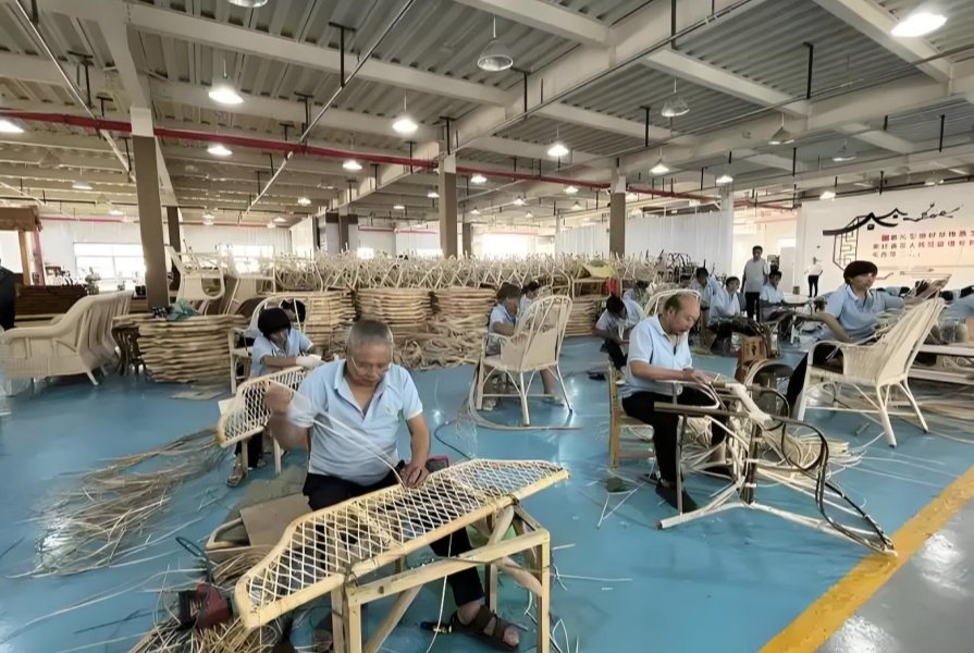 Craftsman demonstrating rattan peel weaving technique
