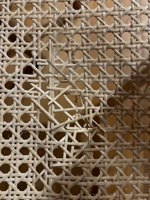 Broken rattan cane webbing