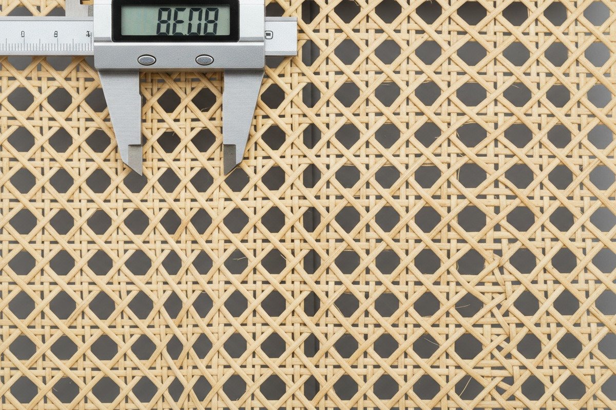 Visual differences between Grade A honey-golden rattan and Grade B greenish rattan webbing (ID#2)